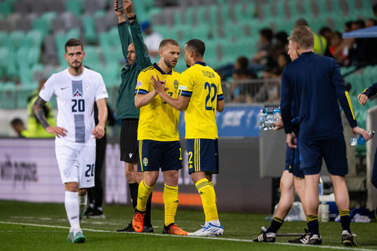 Jesper Karlström and Robin Quaison of Sweden