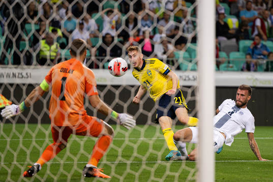 Dejan Kulusevski of Sweden scores the 0-2 goal behind