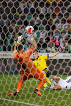 Dejan Kulusevski of Sweden scores the 0-2 goal behind