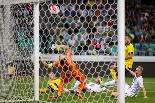 Dejan Kulusevski of Sweden scores the 0-2 goal behind