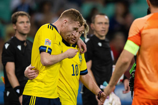 Dejan Kulusevski and Emil Forsberg of Sweden celebrate