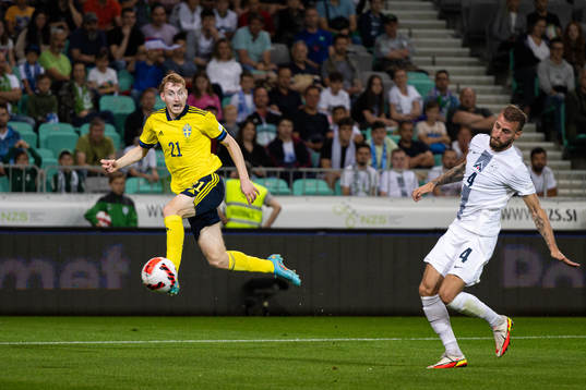 Dejan Kulusevski of Sweden and Miha Blazic of Slovenia