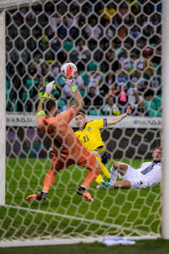 Dejan Kulusevski of Sweden scores 0-2 behind goalkeeper Jan