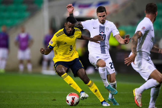 Alexander Isak of Sweden and Petar Stojanovic of Slovenia