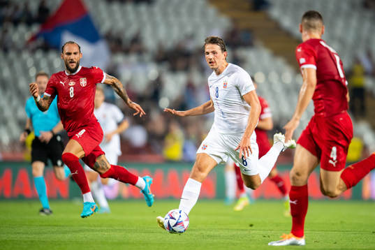Nemanja Gudelj of Serbia and Sander Berge of Norway