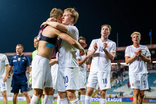 Martin Ødegaard and Mats Møller Dæhli of Norway celebrate