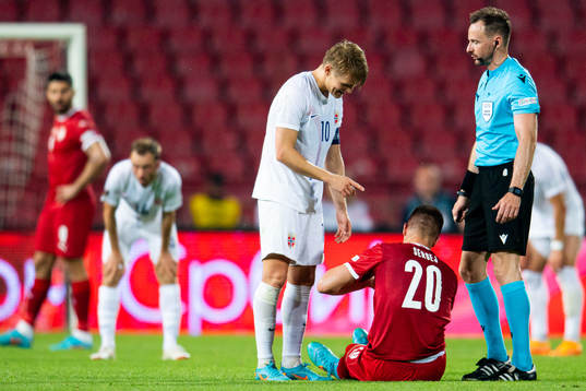 Martin Ødegaard of Norway and Sergej Milinkovic-Savić of