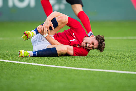 Jørgen Strand Larsen of Norway in pain