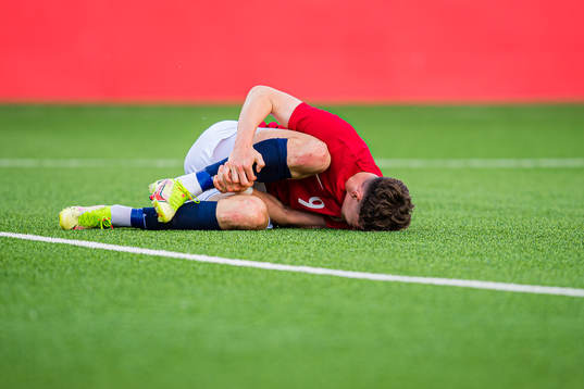 Jørgen Strand Larsen of Norway in pain