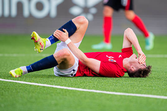 Jørgen Strand Larsen of Norway in pain
