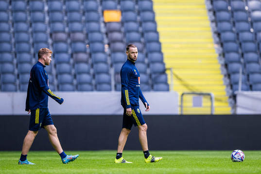 Dejan Kulusevski and Alexander Milosevic of the Swedish