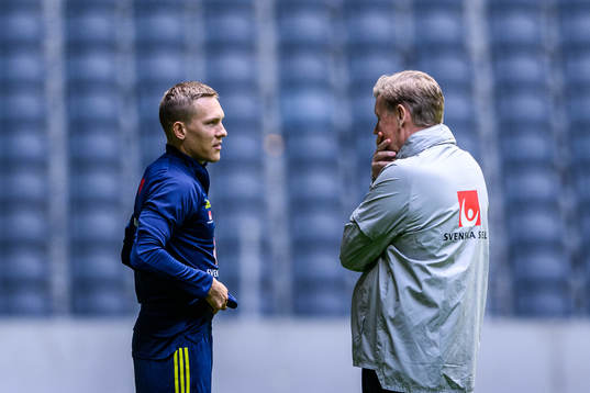 Ludwig Augustinsson and assistant coach Peter Wettergren of