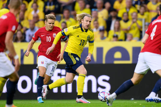 Martin Ødegaard of Norway and Emil Forsberg  of Sweden