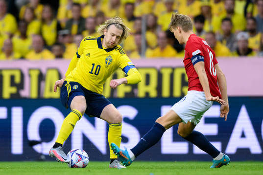 Emil Forsberg of Sweden and Martin Ødegaard of Norway