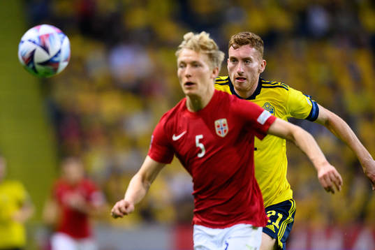 Birger Meling of Norway and Dejan Kulusevski of Sweden