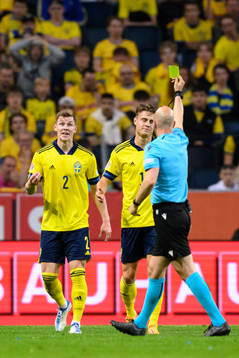 Emil Krafth reacts as Mattias Svanberg of Sweden is shown a