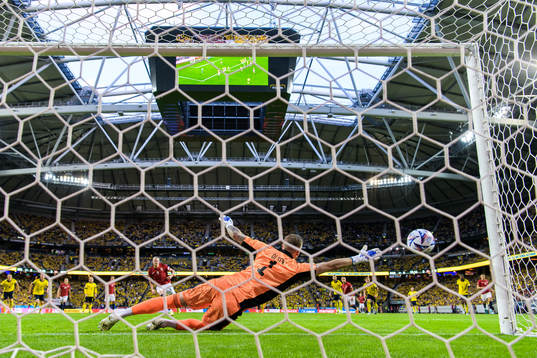 Goalkeeper Robin Olsen of Sweden lets in the 0-1 goal from