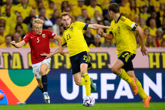 Birger Meling of Norway and Dejan Kulusevski of Sweden