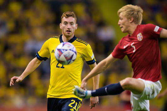Dejan Kulusevski of Sweden and Birger Meling of Norway