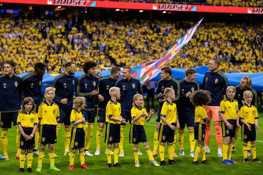 Players of Sweden cheer