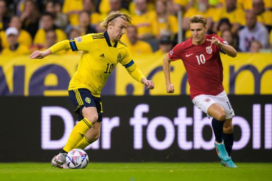 Emil Forsberg of Sweden and Martin Ødegaard of Norway