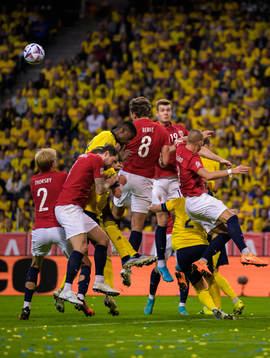 Alexander Isak of Sweden challenges Morten Thorsby, Stefan