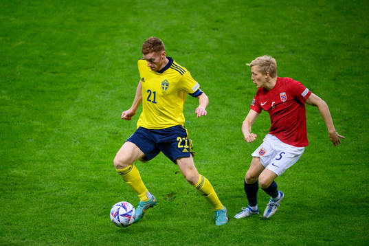 Dejan Kulusevski of Sweden and Birger Meling of Norway