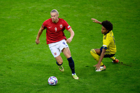 Erling Braut Haaland of Norway and Jens Cajuste of Sweden