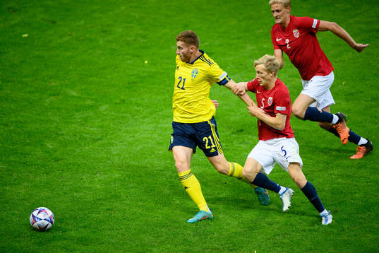 Dejan Kulusevski of Sweden and Birger Meling +of Norway