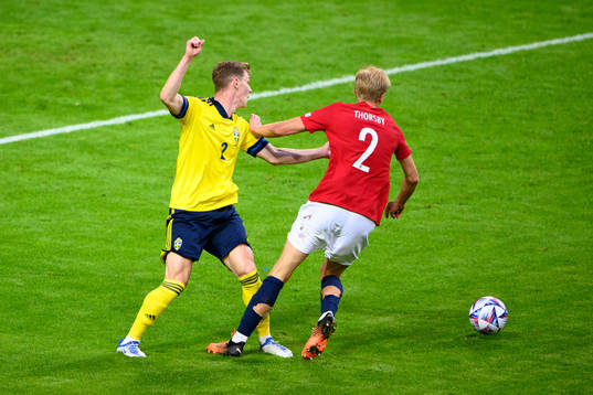 Emil Krafth of Sweden and Morten Thorsby of Norway