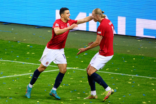Mohamed Elyounoussi and Erling Braut Haaland of Norway