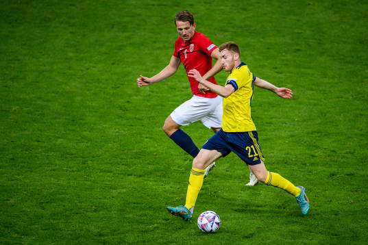 Sander Berge of Norway and Dejan Kulusevski of Sweden
