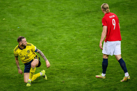 Alexander Milosevic of Sweden and Erling Braut Haaland of