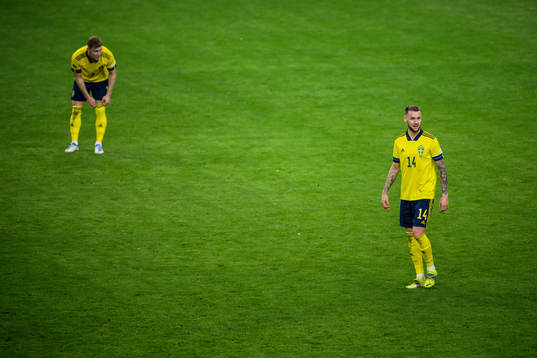 Emil Krafth and Alexander Milosevic of Sweden look dejected