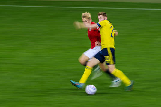 Birger Meling of Norway and Dejan Kulusevski of Sweden