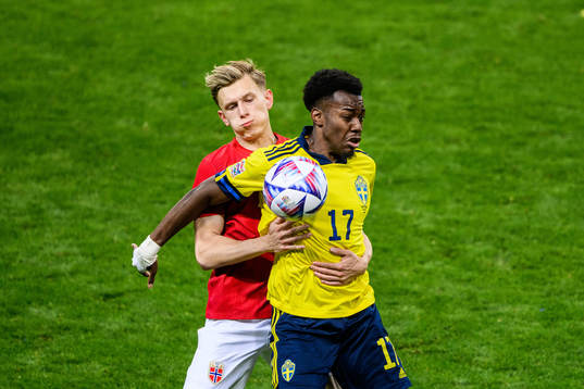 Marcus Holmgren Pedersen of Norway and Anthony Elanga of