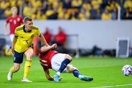 Joakim Nilsson of Sweden and Mohamed Elyounoussi of Norway