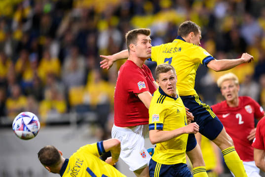 Alexander Sørloth of Norway against Joakim Nilsson of