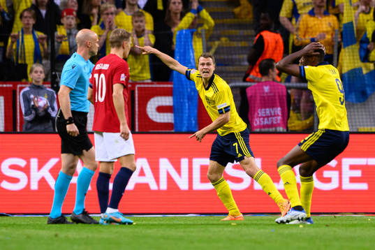 Viktor Claesson and Alexander Isak of Sweden  reacts