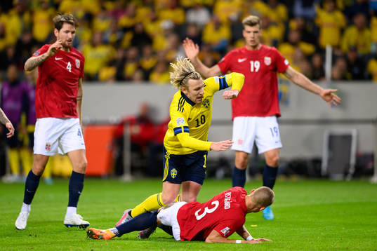 Emil Forsberg of Sweden and Leo Skiri Østigård of Norway