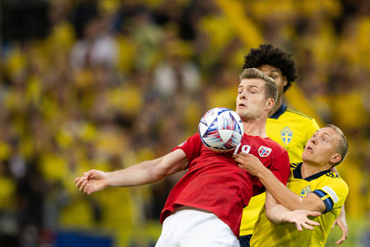 Alexander Sørloth of Norway against Ludwig Augustinsson of
