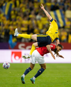 Emil Krafth of Sweden and Joshua King of Norway