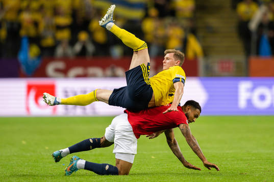 Emil Krafth of Sweden and Joshua King of Norway