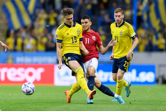 Mattias Svanberg of Sweden and Mohamed Elyounoussi of Norway