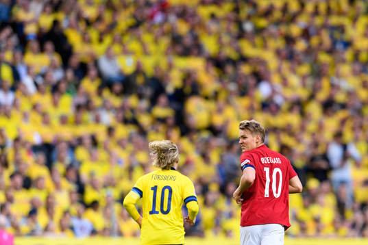 Emil Forsberg of Sweden and Martin Ødegaard of Norway