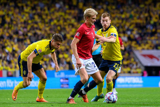 Mattias Svanberg ans Dejan Kulusevski of Sweden against