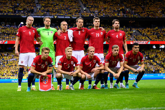 The starting eleven of Norway pose for a team photo