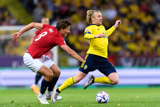 Sander Berge of Norway and Emil Forsberg of Sweden