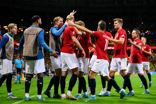 Erling Braut Haaland of Norway celebrates with his teammates