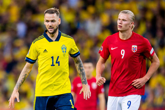 Alexander Milosevic of Sweden and Erling Braut Haaland of